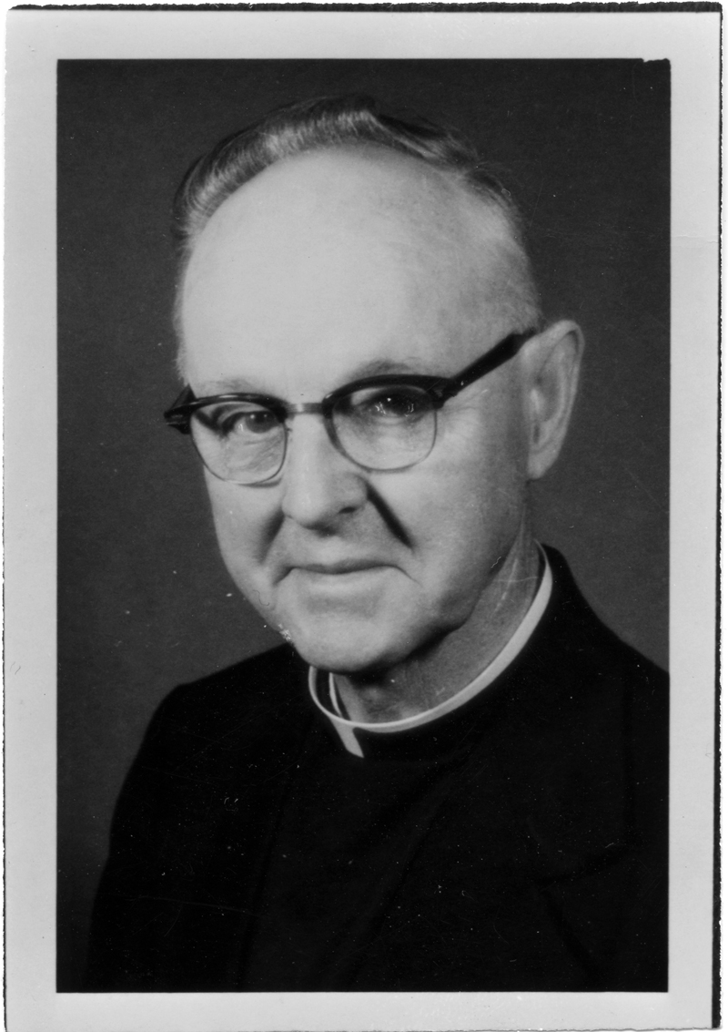 Headshot of Raymond M. HIckey