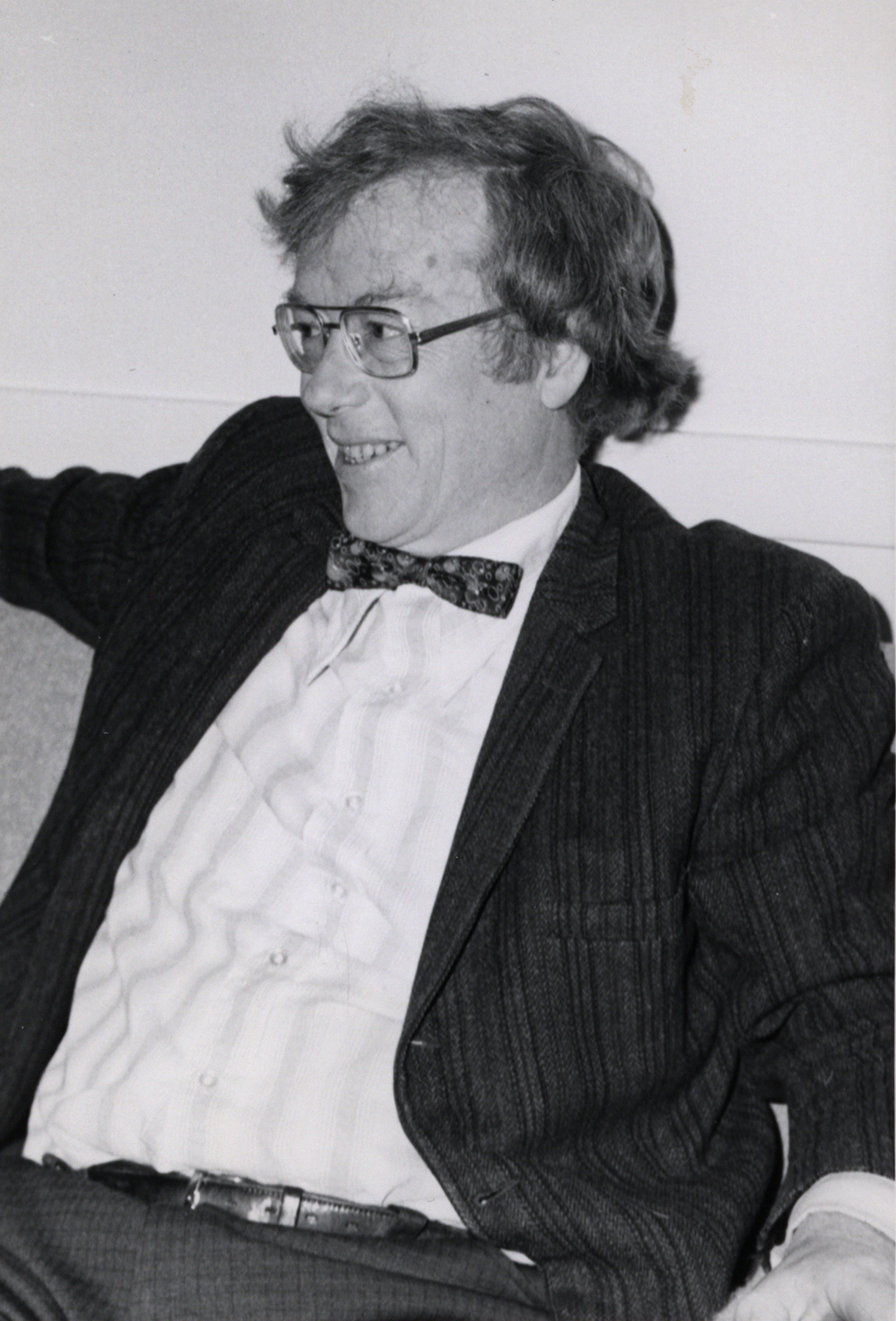 Bill Bauer seated wearing bowtie